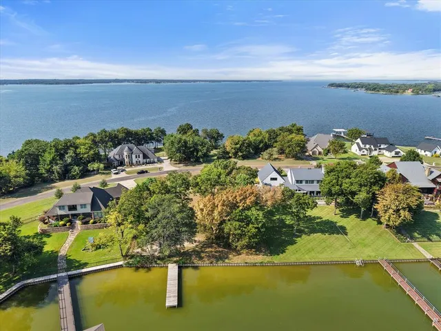 a view of a lake with a yard