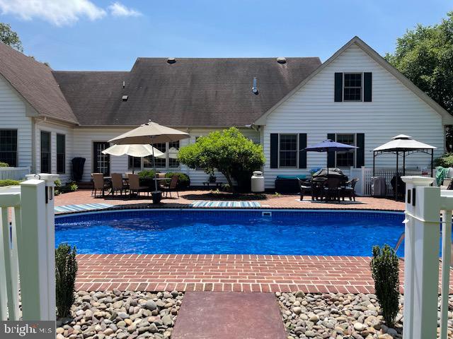 6816 Choptank Landing Hurlock, MD 21643 - Photo 4 of 30 Rear of Home Pool / Patio Area