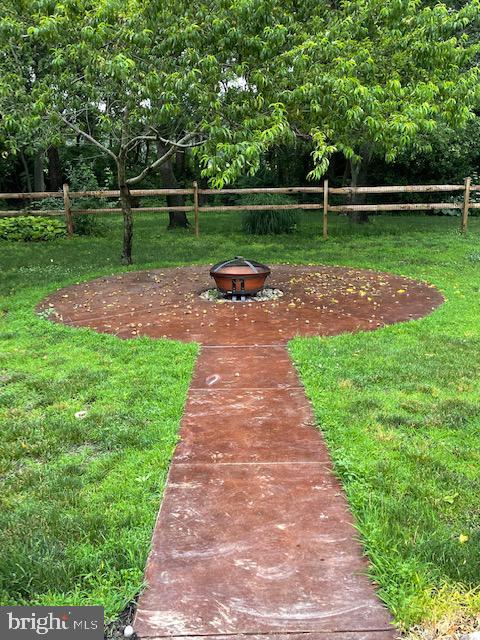 6816 Choptank Landing Hurlock, MD 21643 - Photo 9 of 30 Rear of Home Fire Pit Area