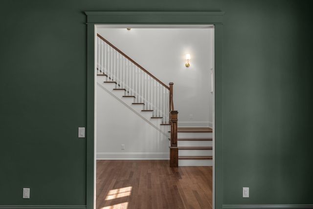 a kitchen with granite countertop a stove and a sink