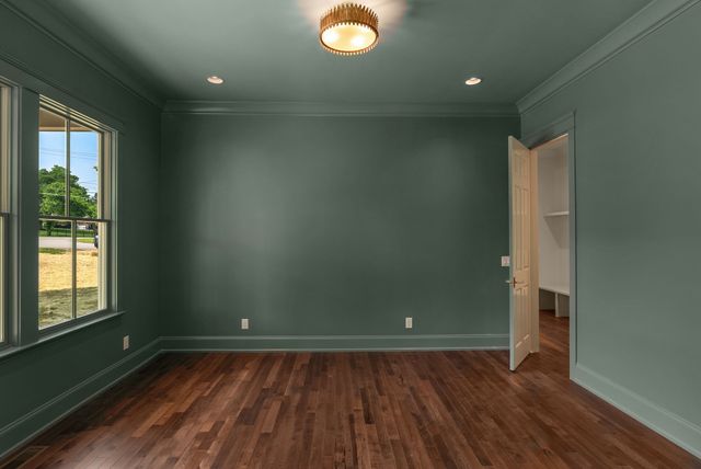 a kitchen with granite countertop a stove and a sink