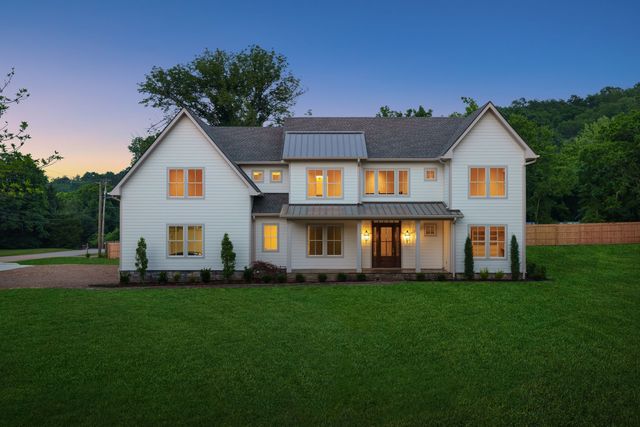 a view of a house with a big yard