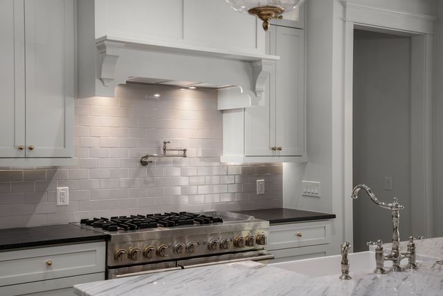 a view of a living room and a potted plant