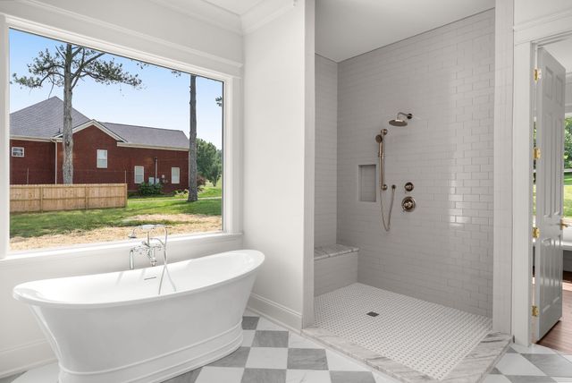 a view of house with backyard