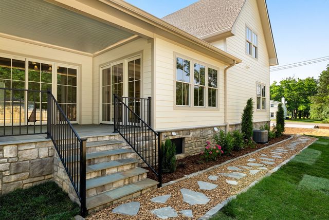 a view of a backyard with a garden