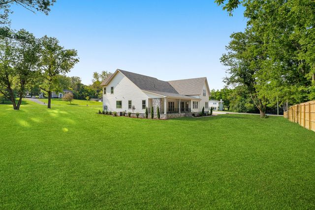 a view of an empty room with a large window