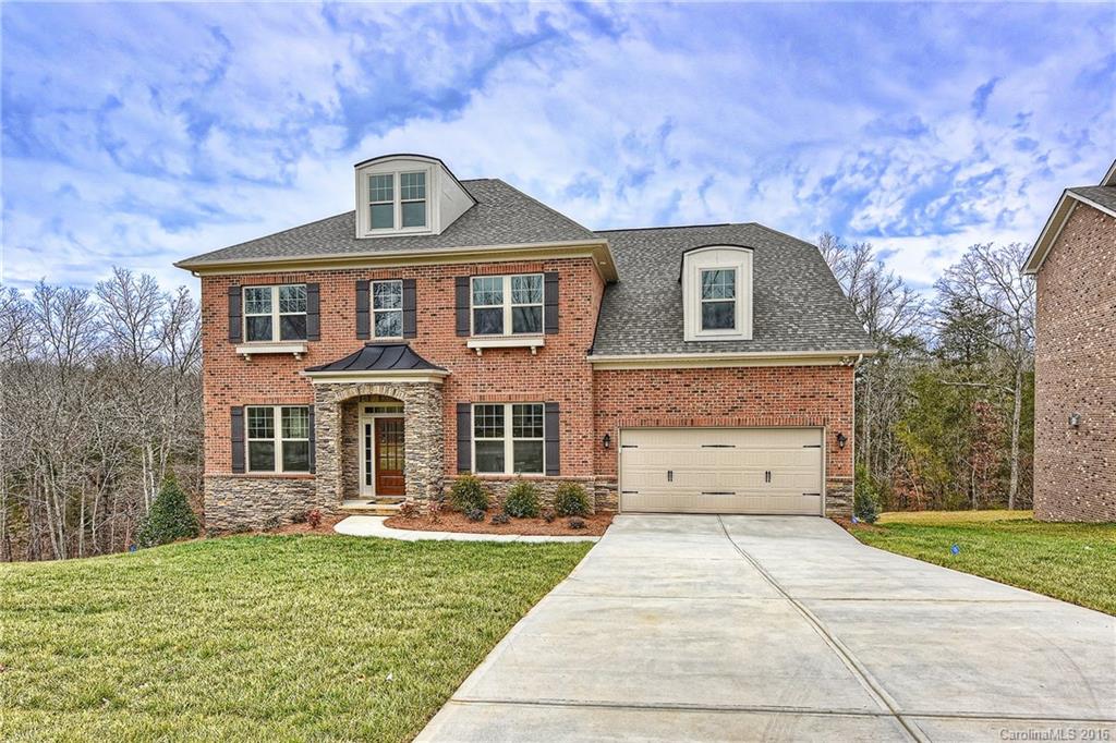 8069 Clems Branch Road Indian Land, SC 29707 - Photo 1 of 24 a front view of a house with a yard