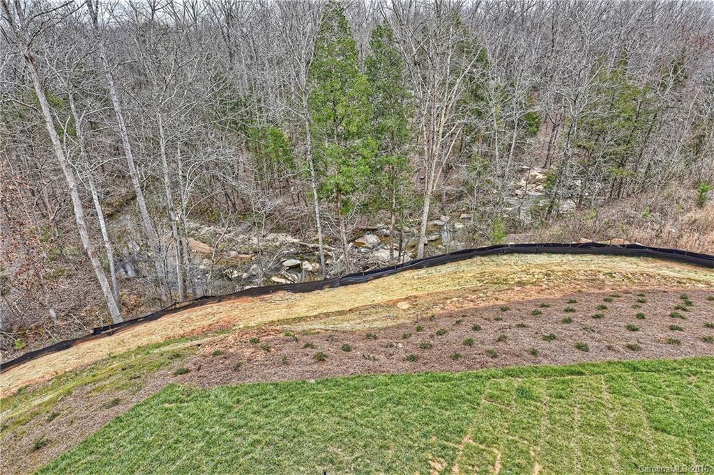 8069 Clems Branch Road Indian Land, SC 29707 - Photo 21 of 24 a view of empty yard with wooden fence