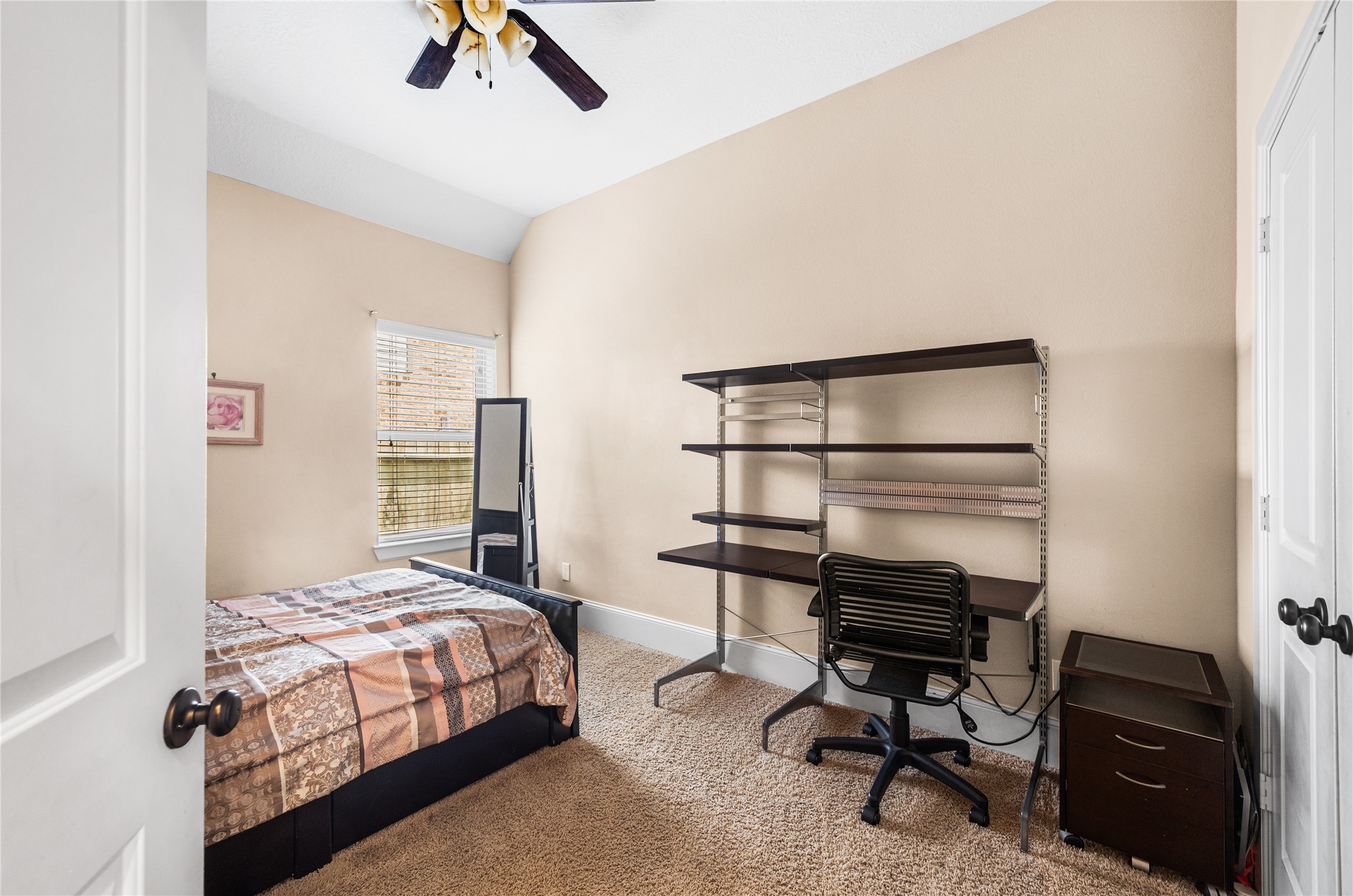 31311 Brighton Brook Lane Spring, TX 77386 - Photo 27 of 47 Generously sized secondary bedroom with space for a bed, desk, nightstand, and comfortable flow throughout.
