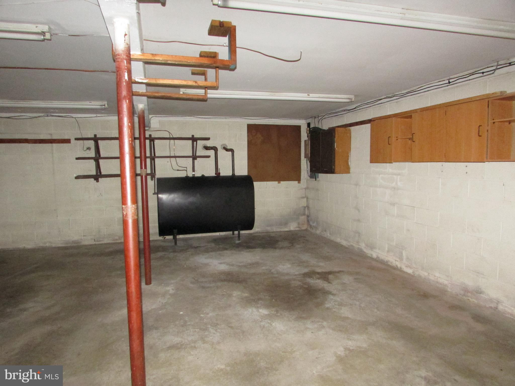 16 Pleasant Valley Road Westminster, MD 21158 - Photo 22 of 24 Cabinets and oil tank in garage