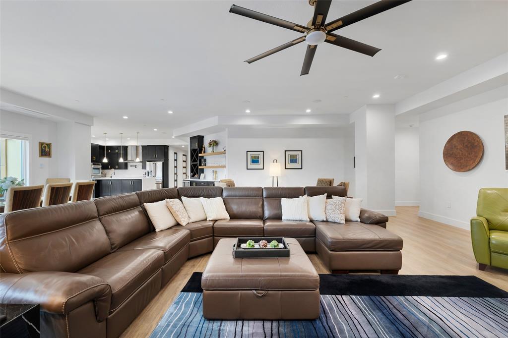 62 Main Street, Unit 200 Colleyville, TX 76034 - Photo 17 of 37 a living room with furniture and a ceiling fan