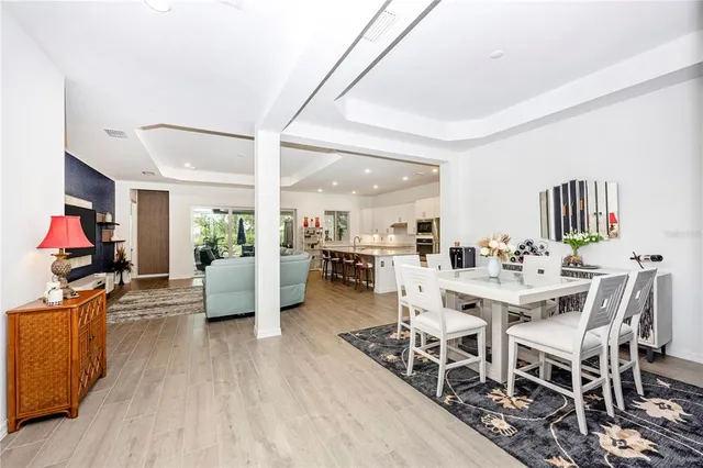 a living room with furniture or couch and a flat screen tv