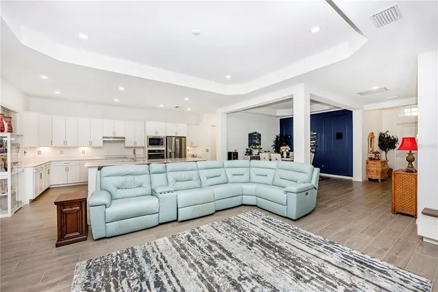 a bathroom with a double vanity sink a mirror and a bathtub