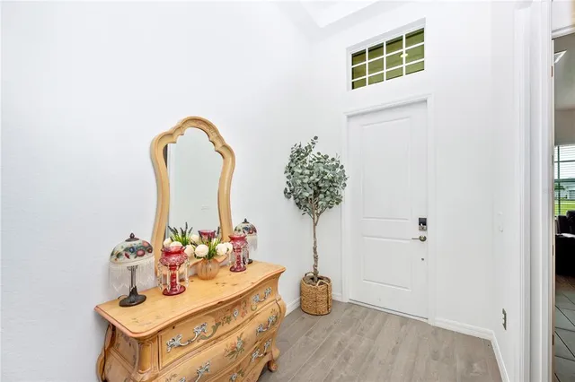 a view of living room with furniture and natural light