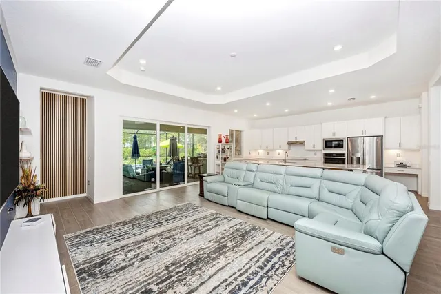 a bedroom with a bed and a table