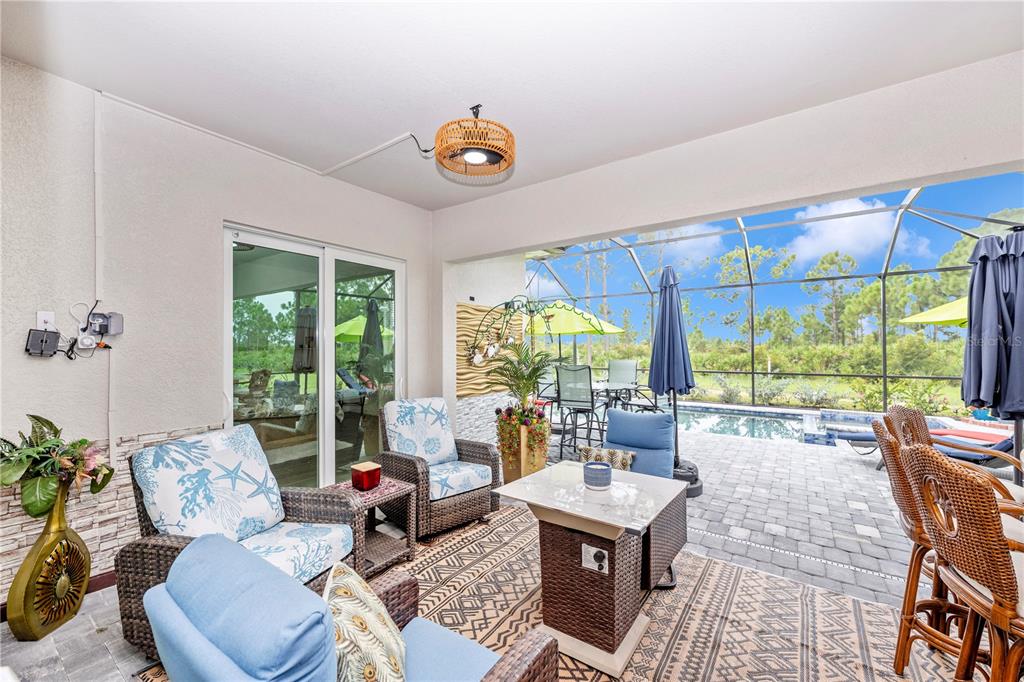 12845 Tulum Loop Venice, FL 34293 - Photo 37 of 100 a living room with furniture and a large window