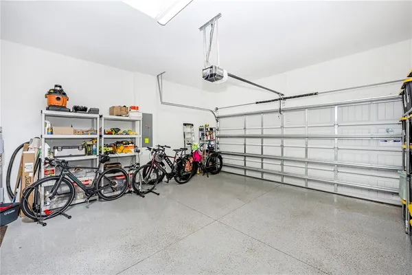 a building with car parked in front of it