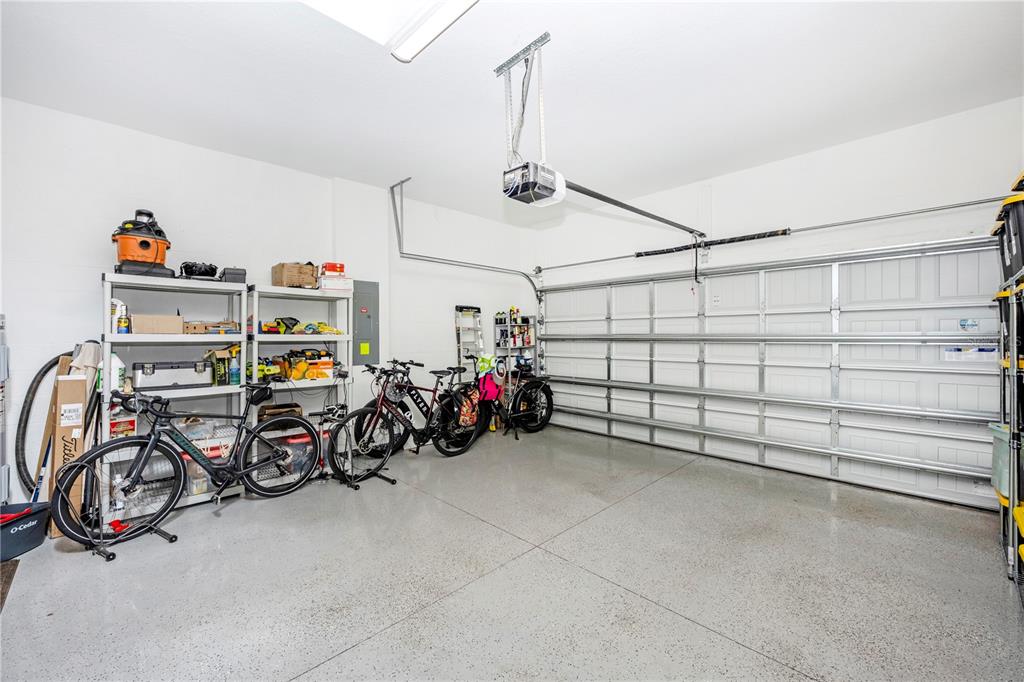 12845 Tulum Loop Venice, FL 34293 - Photo 50 of 100 a view of a garage with storage