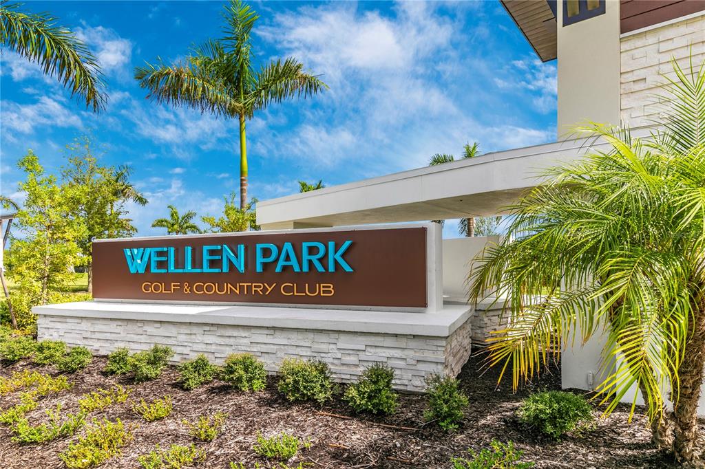 12845 Tulum Loop Venice, FL 34293 - Photo 60 of 100 a sign that is on the side of a building