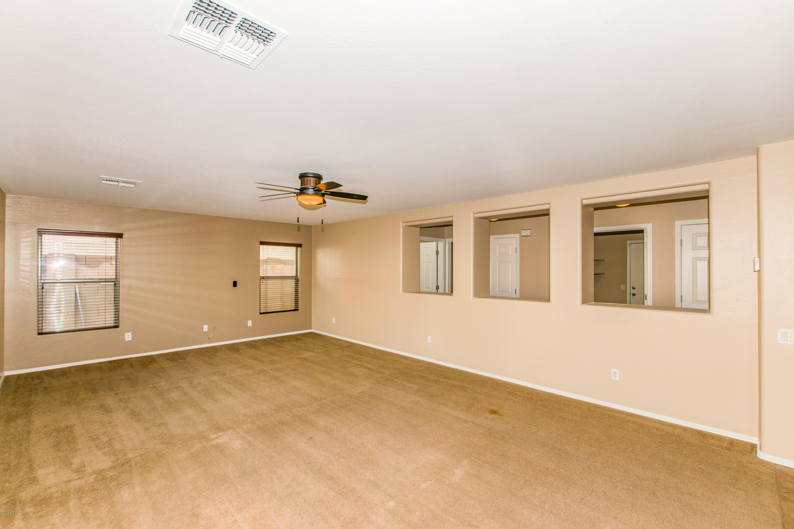 43336 West Magnolia Road Maricopa, AZ 85138 - Photo 11 of 35 11 Family Room