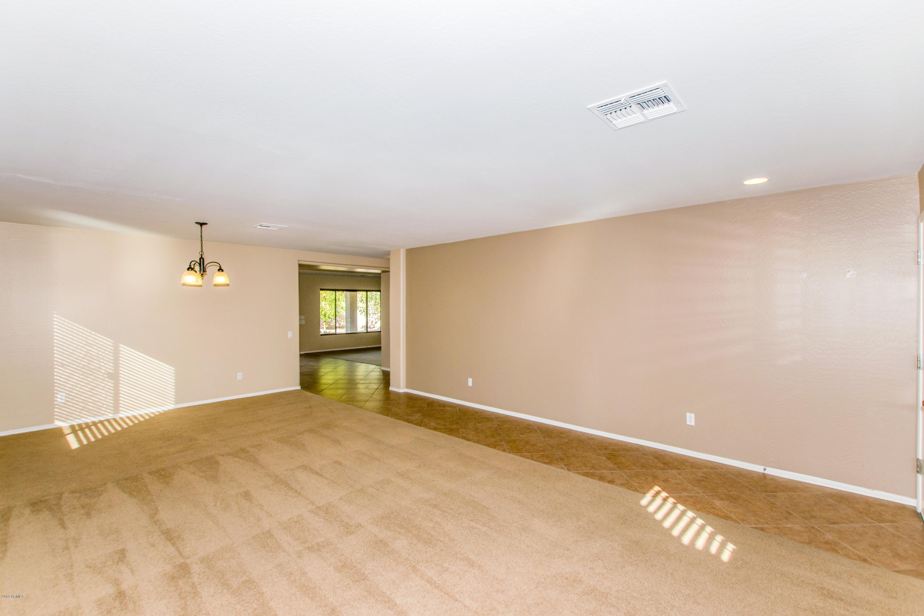 43336 West Magnolia Road Maricopa, AZ 85138 - Photo 4 of 35 04 Living Room