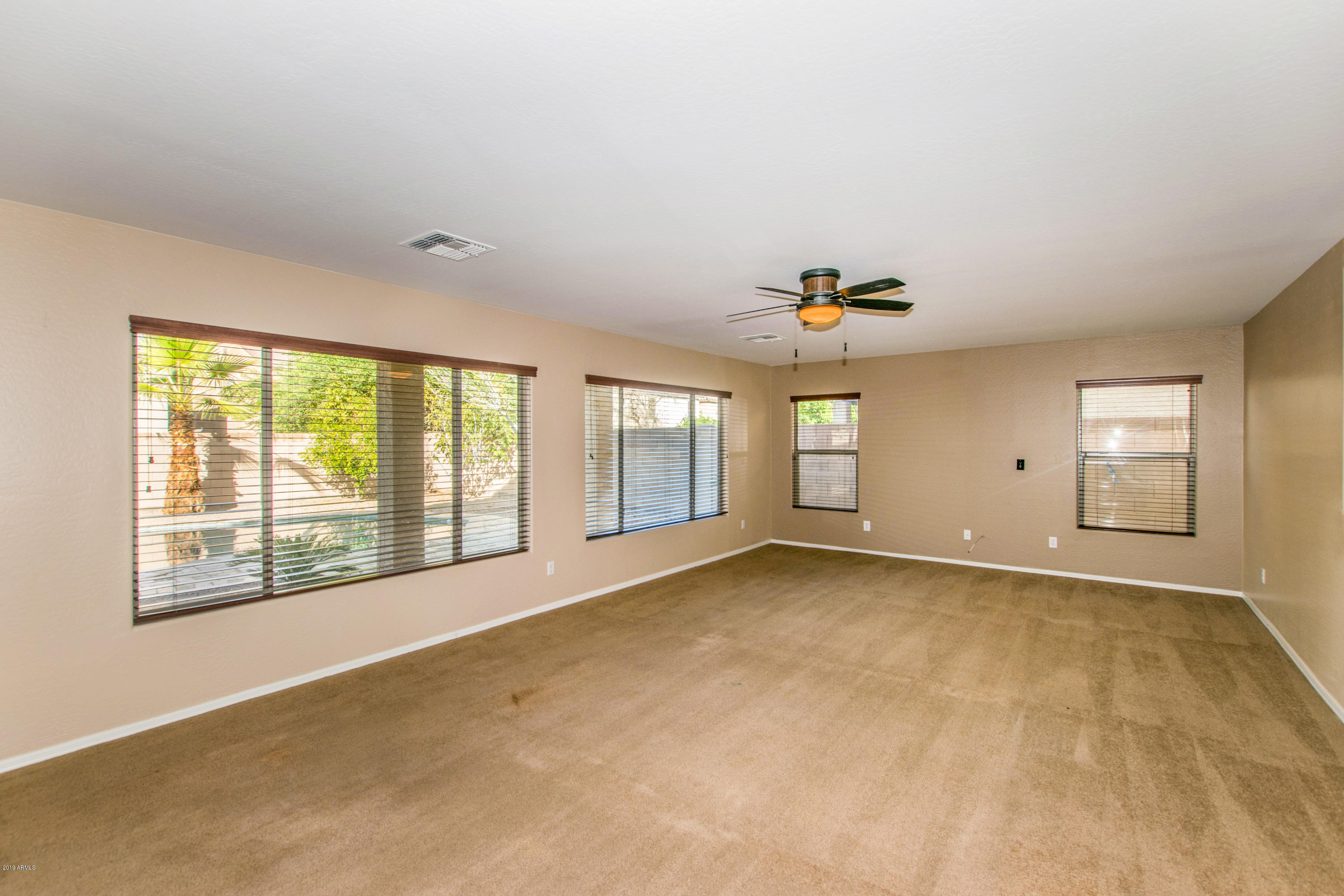 43336 West Magnolia Road Maricopa, AZ 85138 - Photo 10 of 35 10 Family Room