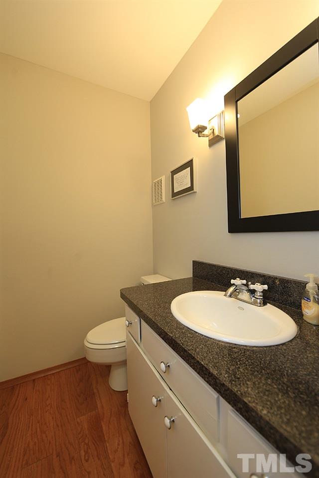 2842 Wycliff Road Raleigh, NC 27607 - Photo 14 of 30 Main level half bath.