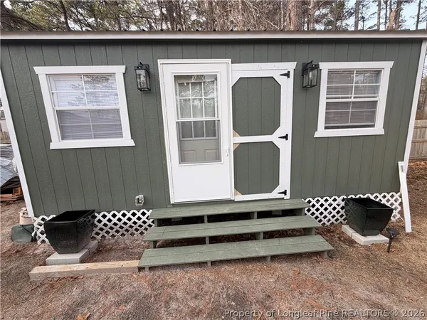 a bathroom with a toilet and a sink