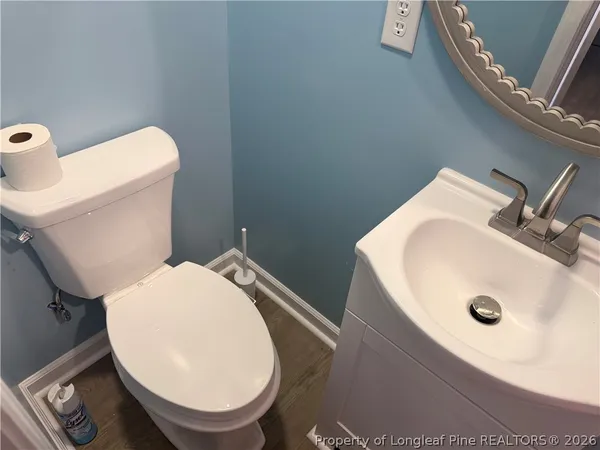 a bathroom with a sink and toilet