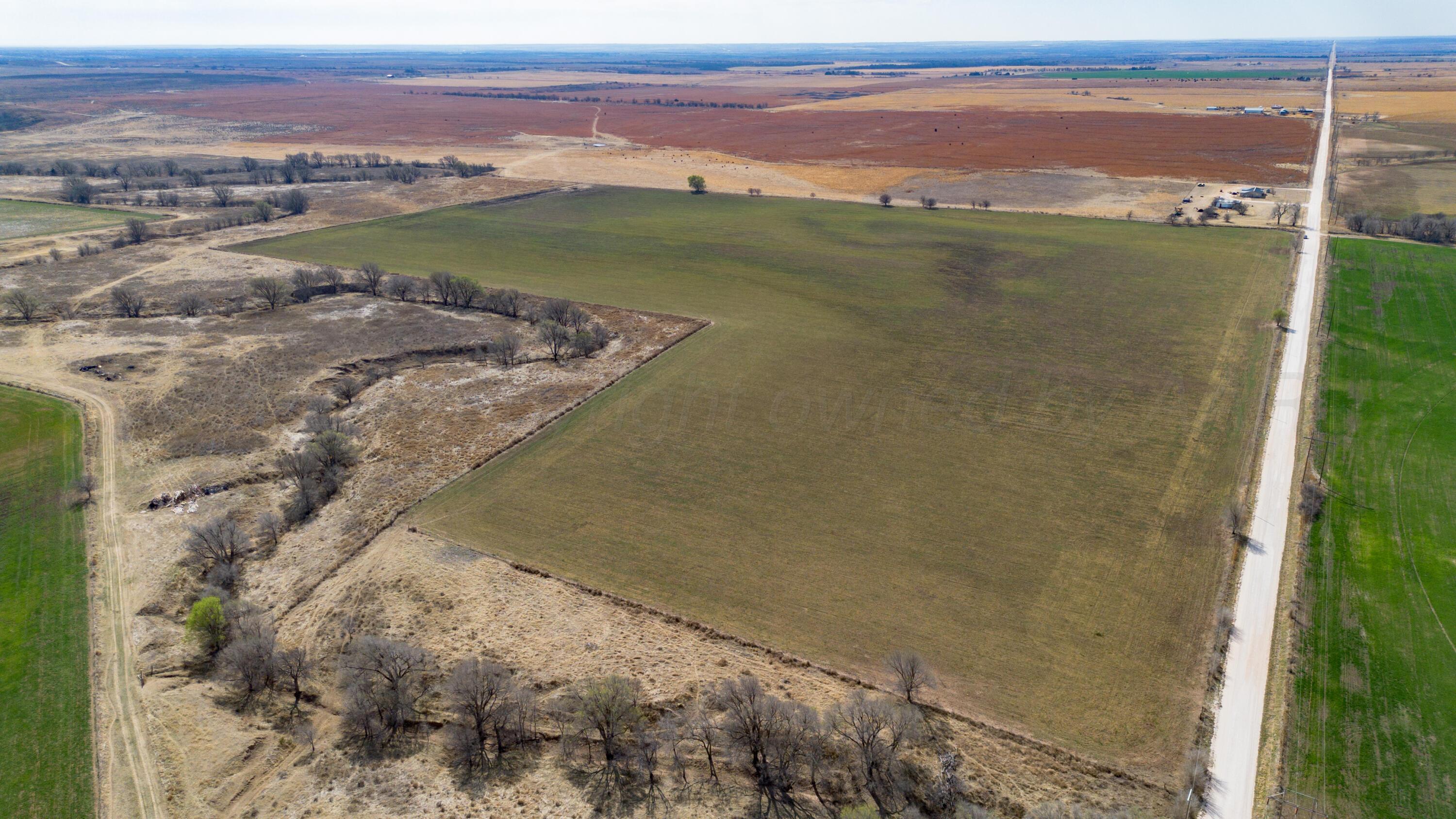 Dodd Farm Mobeetie, TX 79061 - Photo 43 of 46 a view of a lake with beach and city