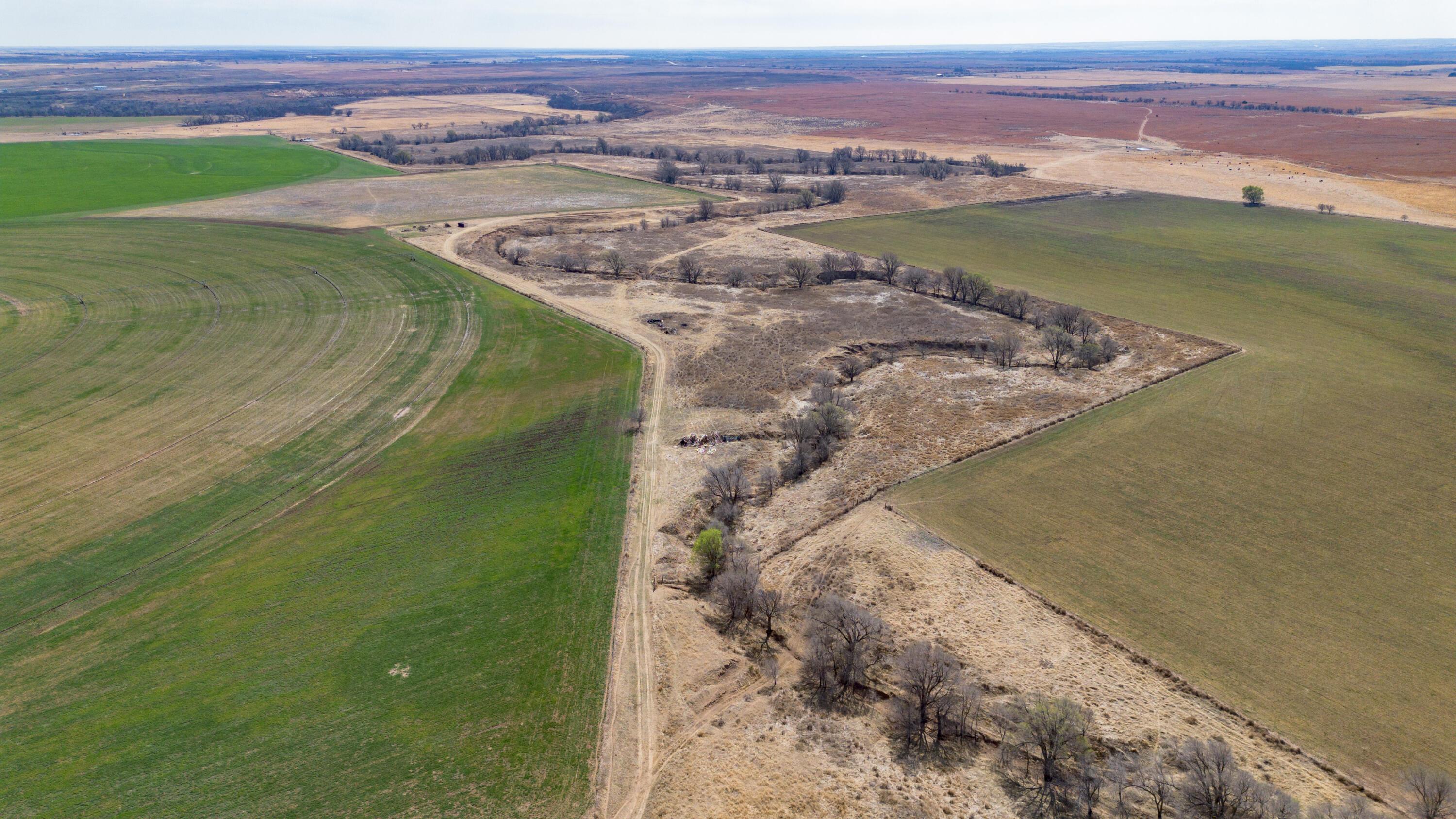 Dodd Farm Mobeetie, TX 79061 - Photo 44 of 46 a view of a lake with a mountain