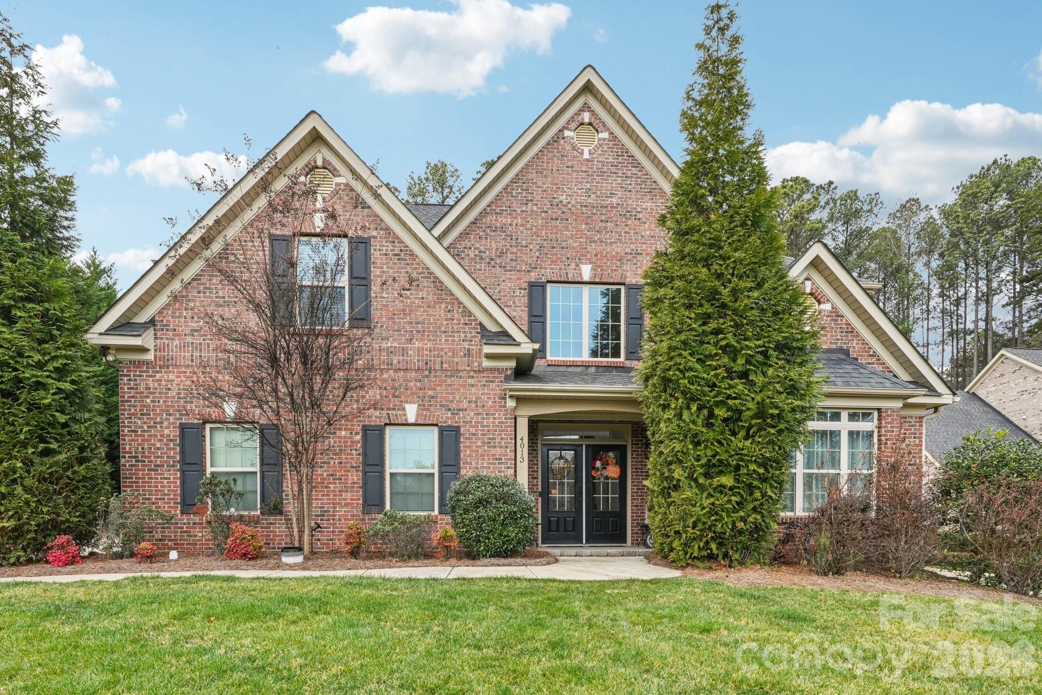 4013 Spindrift Cove Denver, NC 28037 - Photo 1 of 46 front view of a house with a yard