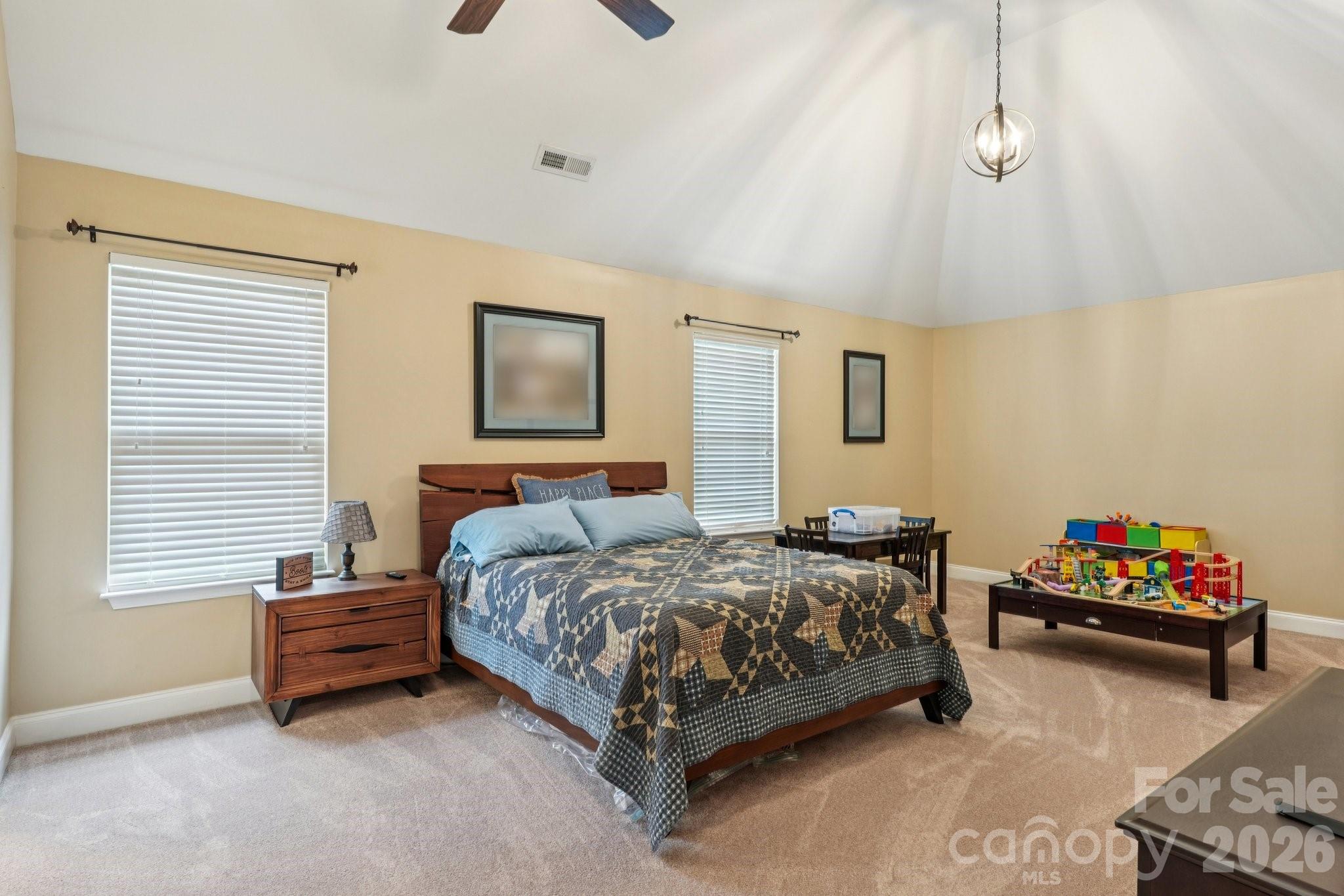 4013 Spindrift Cove Denver, NC 28037 - Photo 21 of 46 a bedroom with a bed and a window