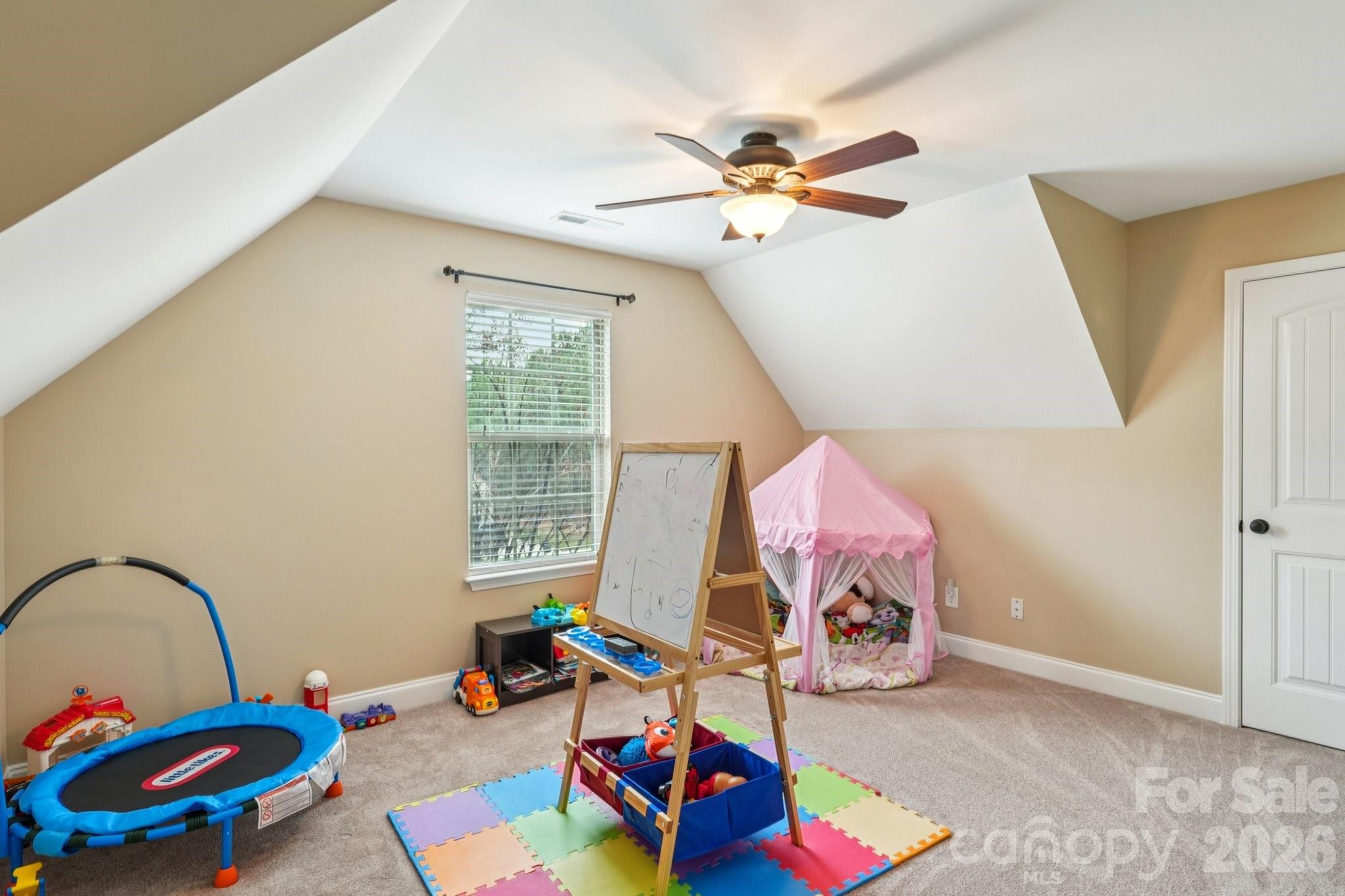4013 Spindrift Cove Denver, NC 28037 - Photo 27 of 46 a bedroom with furniture and a window