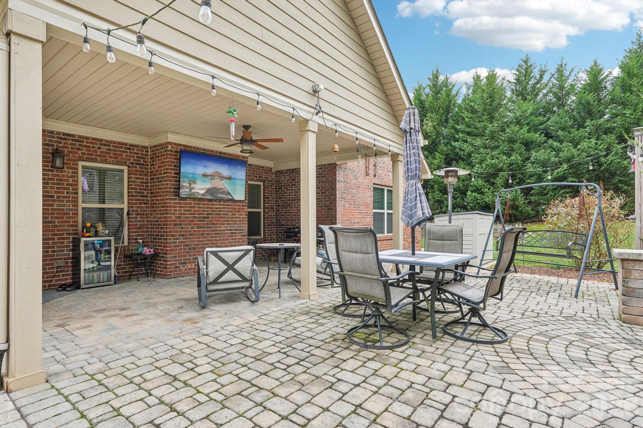 4013 Spindrift Cove Denver, NC 28037 - Photo 32 of 46 a view of a patio with a table and chairs