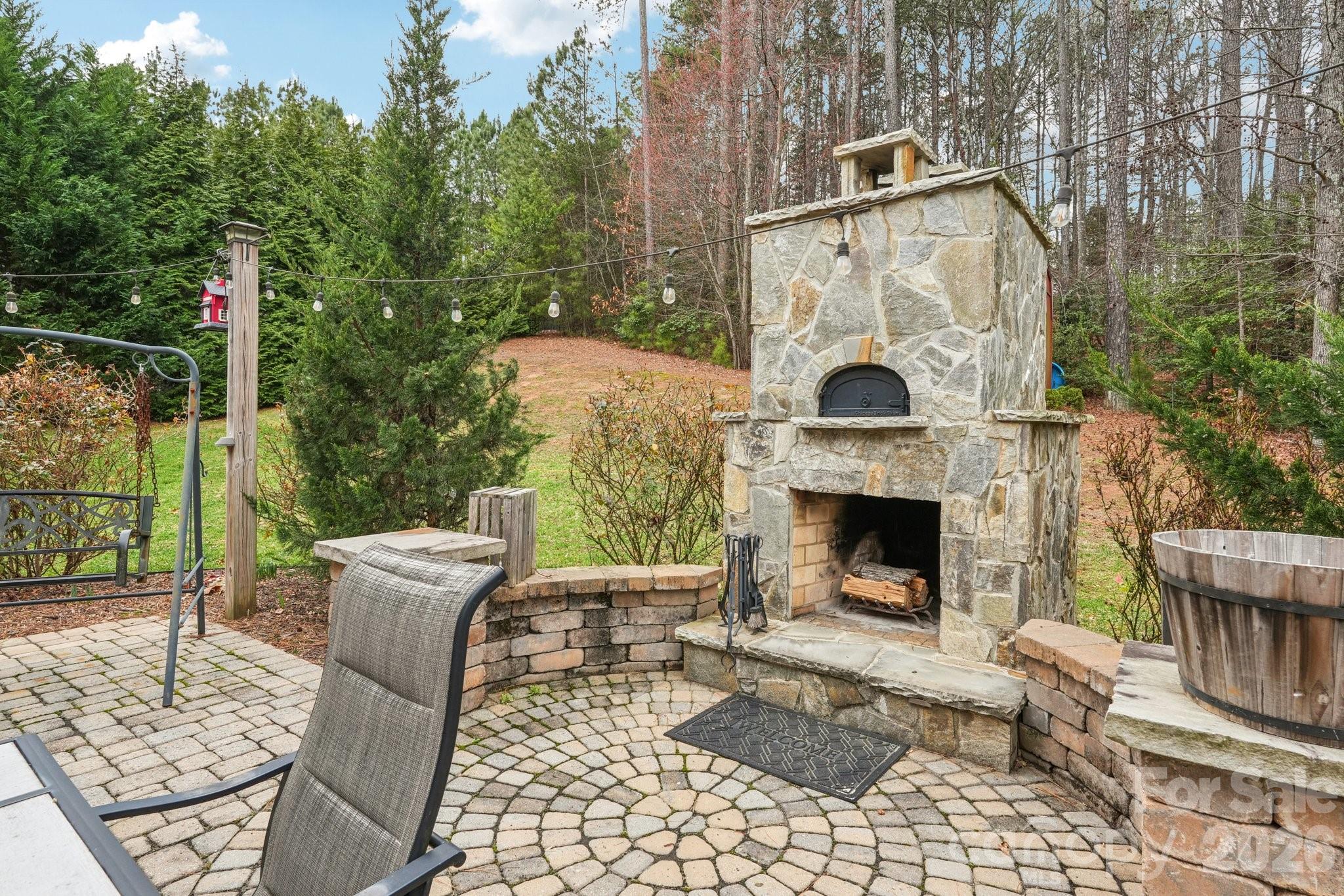 4013 Spindrift Cove Denver, NC 28037 - Photo 33 of 46 a front view of a house with outdoor seating