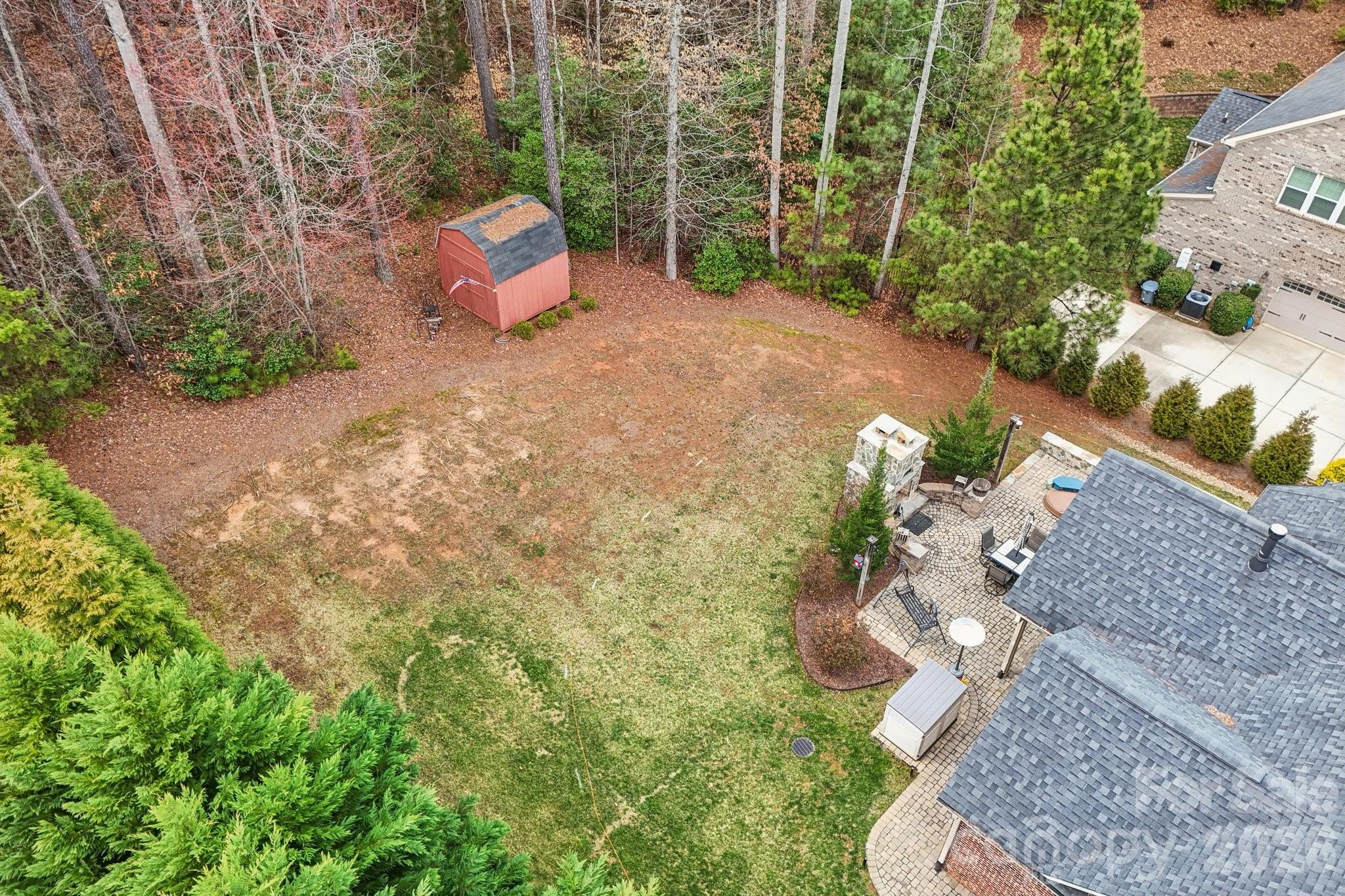 4013 Spindrift Cove Denver, NC 28037 - Photo 37 of 46 a plant is in middle of garden