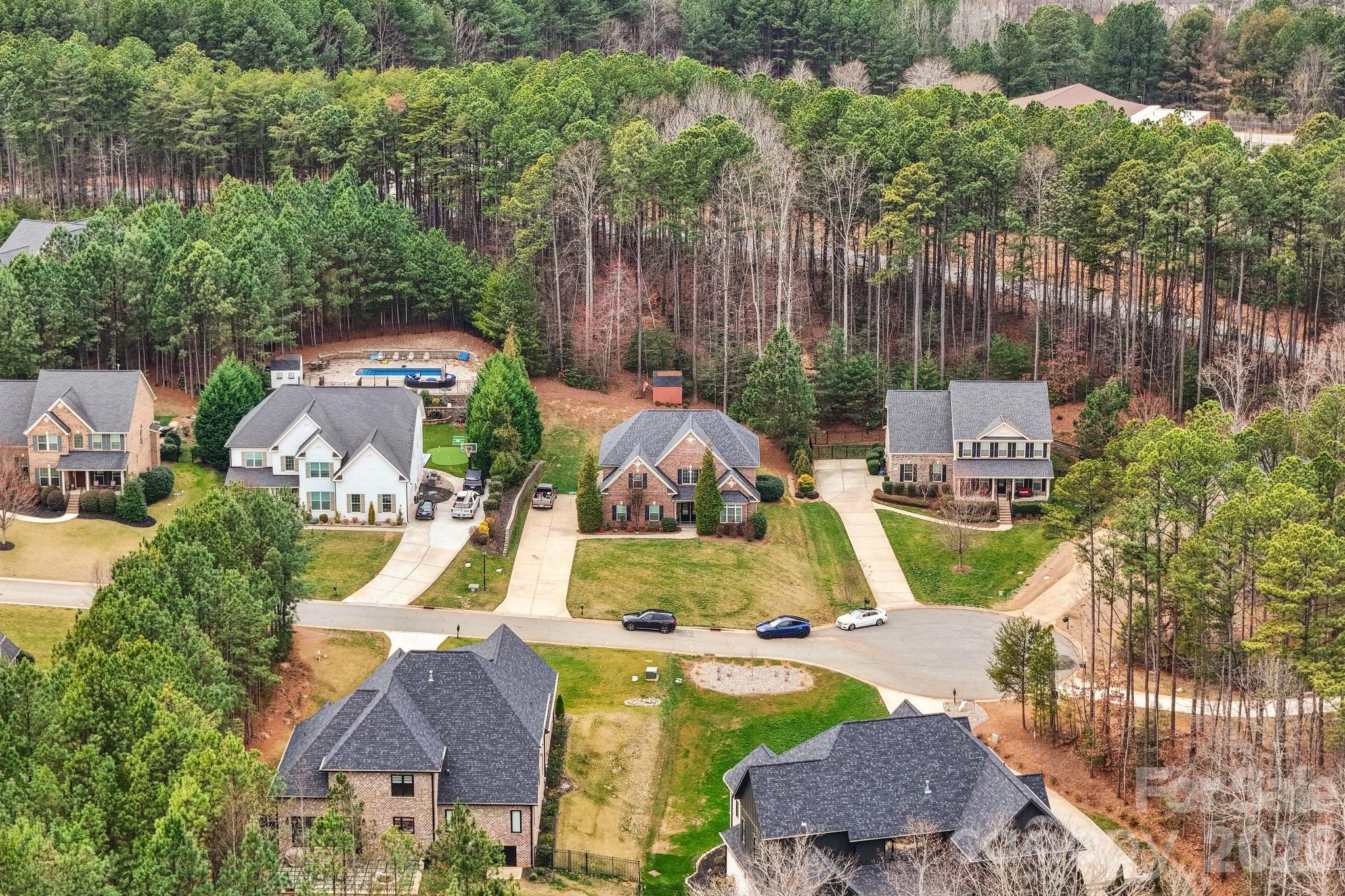 4013 Spindrift Cove Denver, NC 28037 - Photo 40 of 46 an aerial view of a house with swimming pool garden and patio