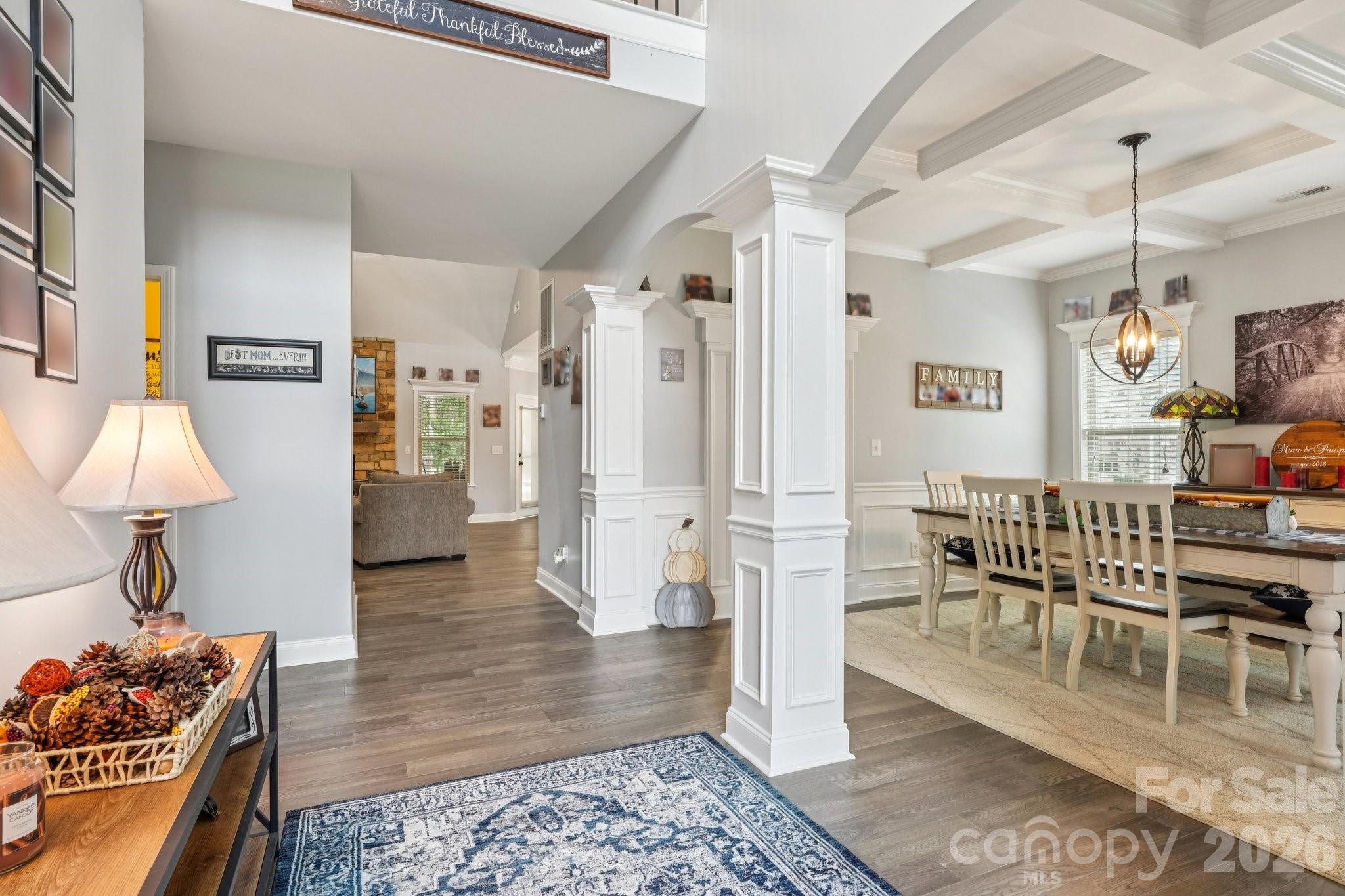 4013 Spindrift Cove Denver, NC 28037 - Photo 4 of 46 a living room with furniture and a wooden floor