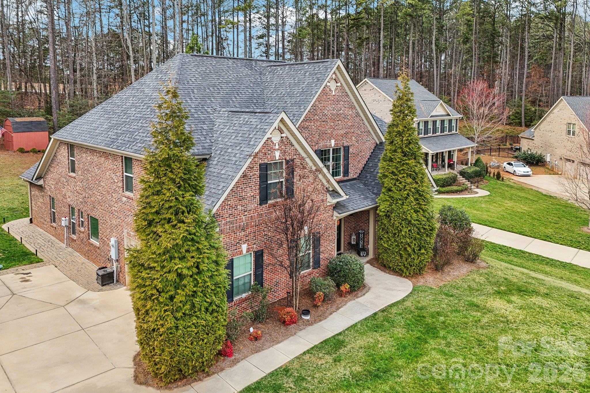 4013 Spindrift Cove Denver, NC 28037 - Photo 45 of 46 a aerial view of a house next to a big yard and large trees