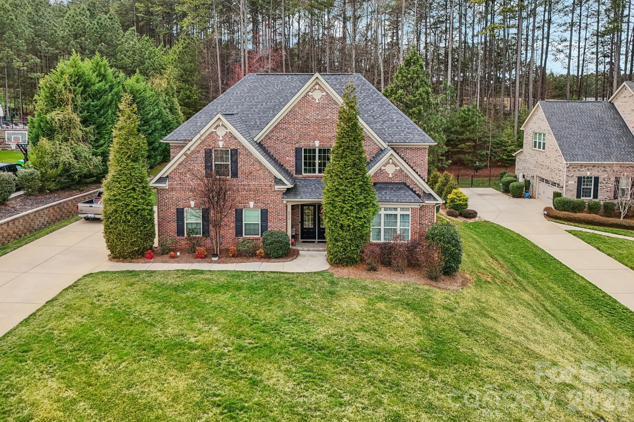 4013 Spindrift Cove Denver, NC 28037 - Photo 46 of 46 a view of a house with a yard and sitting area