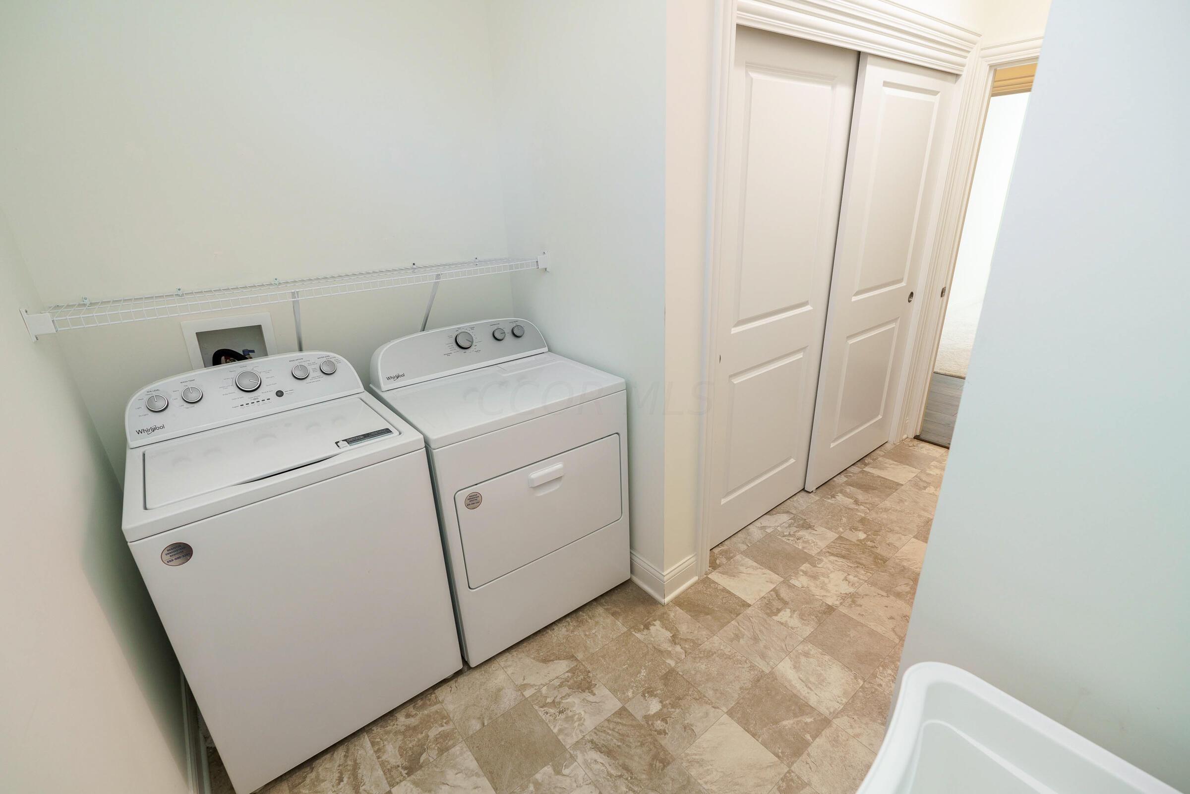 3243 Scioto Rdg Road Dublin, OH 43017 - Photo 32 of 51 Entry level laundry room with washer and dryer to remain