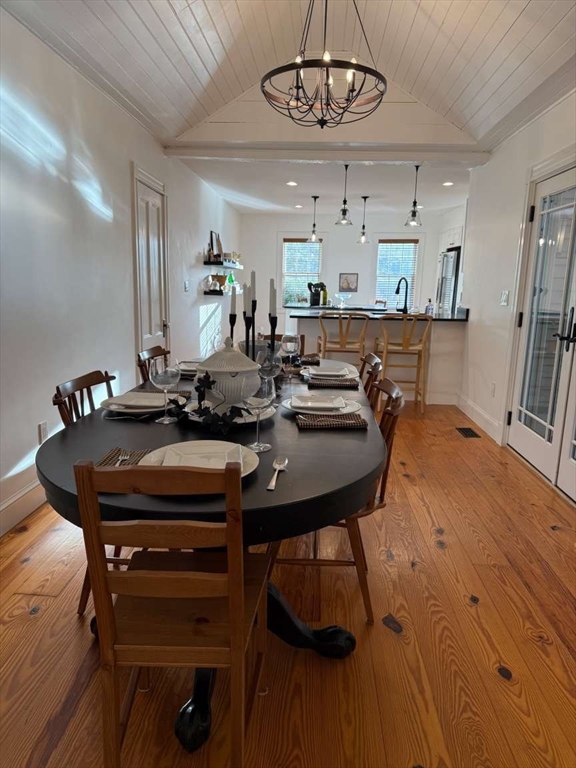 105 Elm Street, Unit A Andover, MA 01810 - Photo 17 of 40 a view of a dining room with furniture