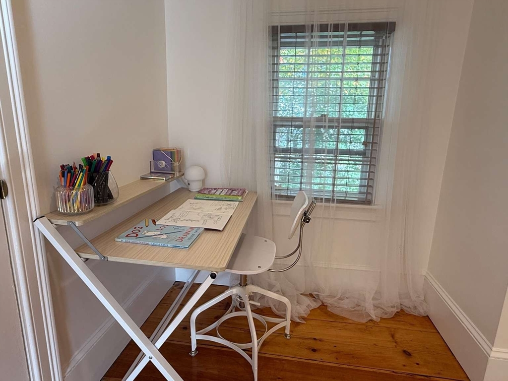 105 Elm Street, Unit A Andover, MA 01810 - Photo 32 of 40 a workspace with furniture and window