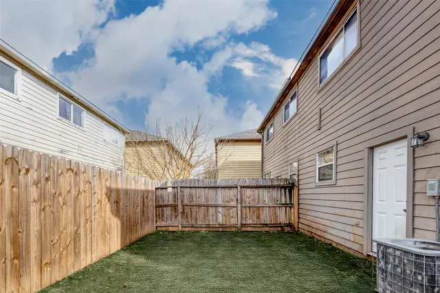 a view of backyard with cabin