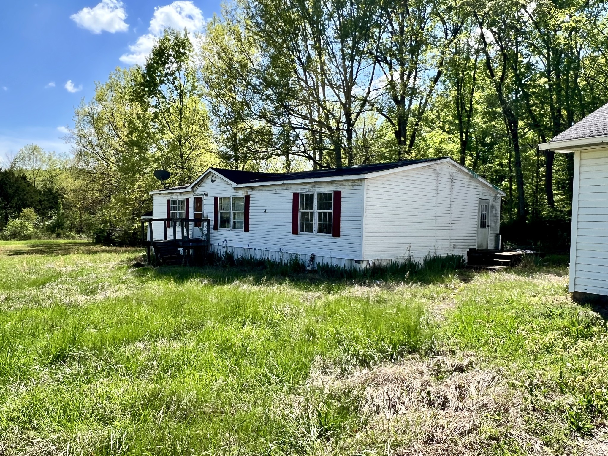 4552 Kedron Road Spring Hill, TN 37174 - Photo 8 of 21 a view of a house with backyard and garden