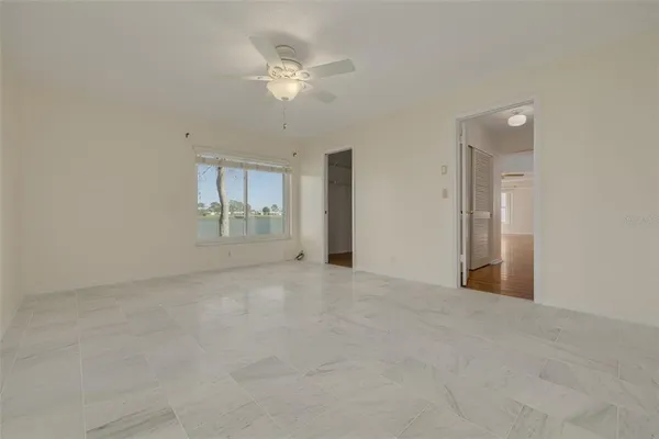 an aerial view of a house with a lake view