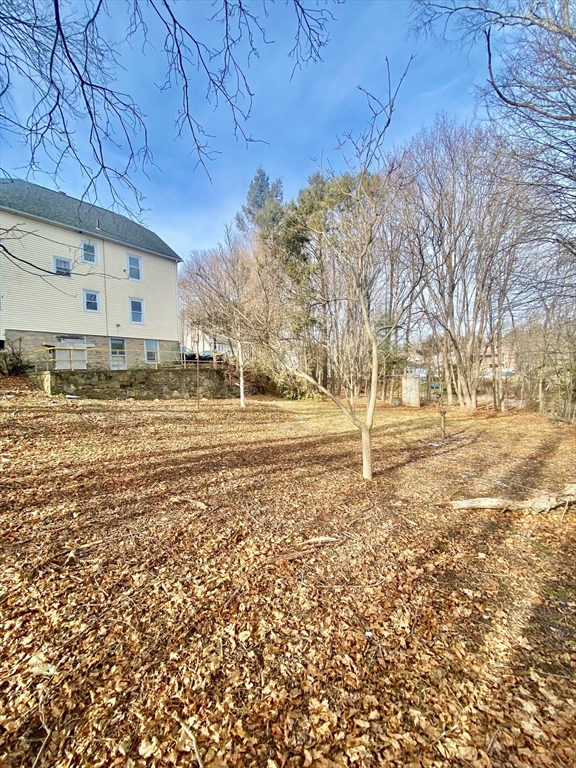7 3rd Avenue Dudley, MA 01571 - Photo 16 of 19 a view of road with large trees