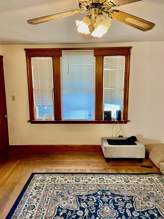 7 3rd Avenue Dudley, MA 01571 - Photo 3 of 19 a front view of a house with a yard