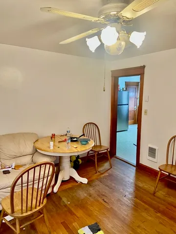 a balcony with wooden floor
